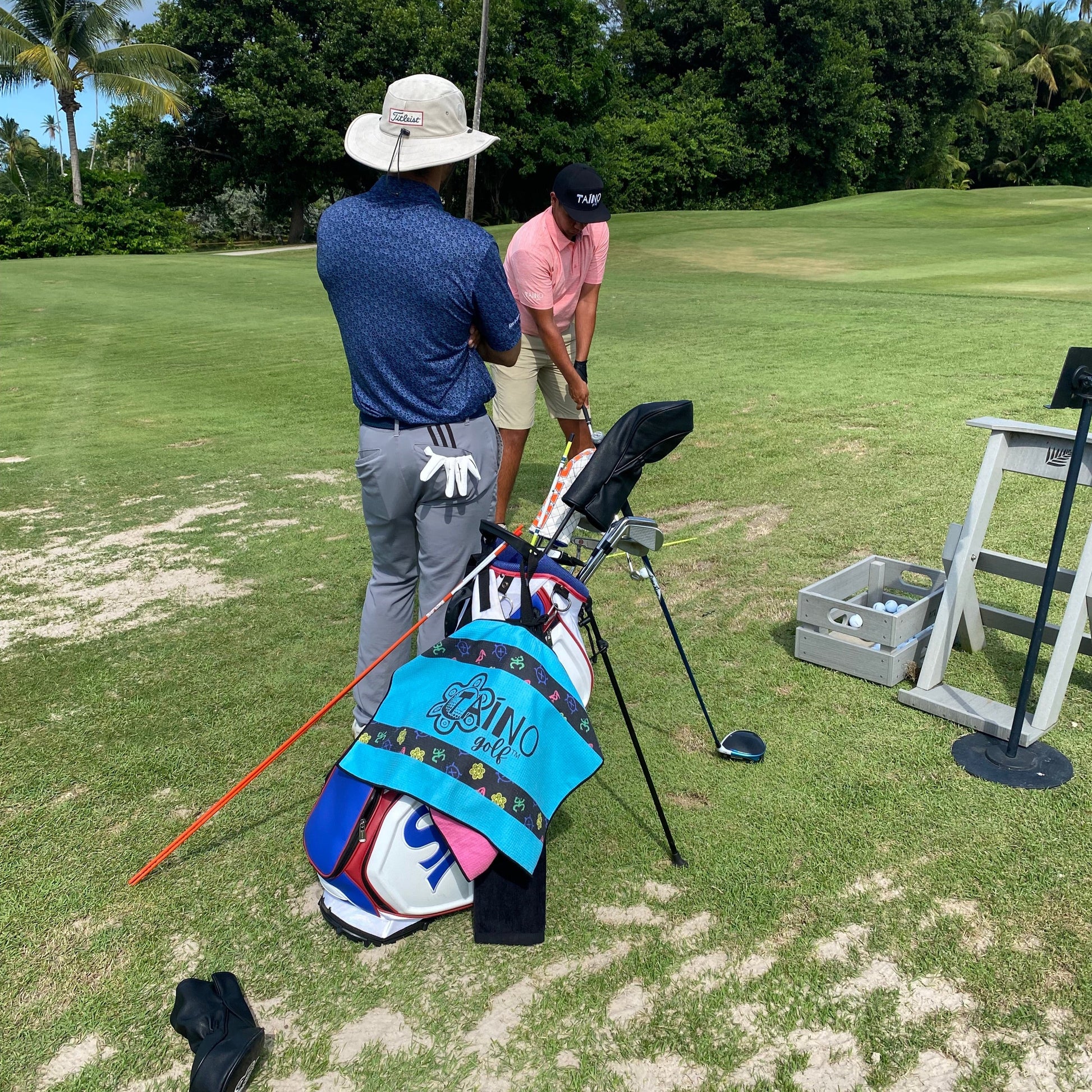 Taino Golf teal, microfibre waffle towel, featuring a durable, absorbent fabric for cleaning golf clubs and hands, with native inspired design and Taino Golf branding.